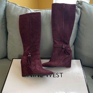 Great condition wine colored wedge riding boot